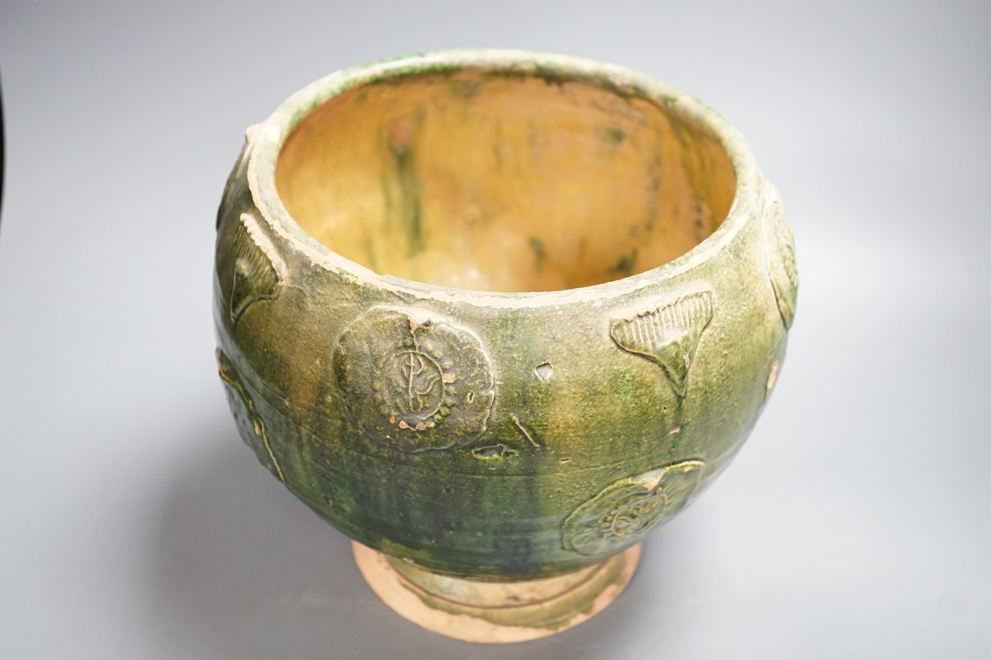 A large Chinese green glazed jar and cover, Liao dynasty, 35cm high
